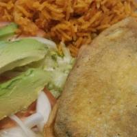 Chile Relleno  · Cheese-filled poblano pepper served with rice and beans