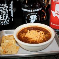 Cowboy Beer Chili · A spicy bowl of chili made with beer, bison, and cactus.