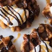 The Melt Show With Ice Cream · Delicious Belgium waffle, pearl sugar, whip cream, chocolate sauce.