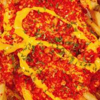 Hot Cheetos Cheese Fries · Fries with melted cheese, topped with Xxtra Flamin Hot Cheetos.