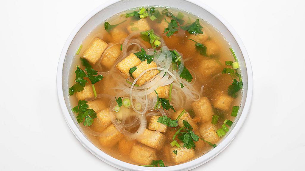 Fried Tofu Soup · Vietnamese beef broth (can be substituted for veggie broth ) with pho, square cut fried tofu, scallion, cilantro and fresh yellow onion ring on top. served with bean sprout, jalapeno and lime on the side.