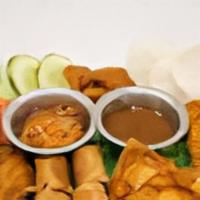 Saigon Sampler · Two egg rolls, two chicken wings, two krap rangoon, two shrimp tempura.