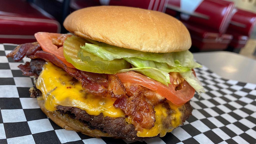 Bacon & Cheese Classic Burger (Large) · Large. Hamburger topped with cheese and bacon.