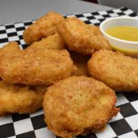 Chicken Nuggets Combo · Breaded or battered crispy chicken.