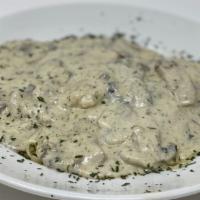 Chicken Cremore Mushrooms · Sauteed chicken breast with mushrooms in a creamy white wine sauce over your choice of pasta.