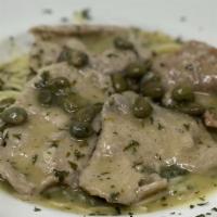 Veal Piccata · Sauteed with butter and capers in white wine sauce.