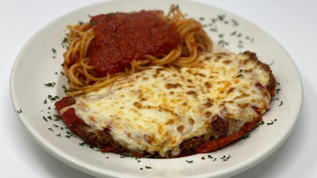Veal Parmigiana · Breaded veal with marinara sauce and mozzarella cheese.