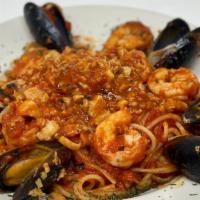 Seafood Combo 1 · Clams, shrimp and mussels in a marinara sauce and served over a bed of linguini pasta.