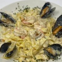 Seafood  Combo Ii · Clams, shrimp & mussels in a cream sauce served over fettuccine pasta
