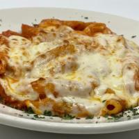Baked Ziti · Macaroni pasta sautéed with marinara sauce, ricotta cheese and baked mozzarella.