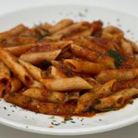 Penne Fra Diavolo · Penne pasta fresh garlic, crushed red pepper and spicy marinara sauce.