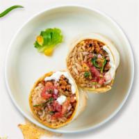 Get Porky! (Carnitas Burrito) · Braised pork shoulder topped with sour cream, salsa, cheese, and spanish rice wrapped in a w...