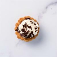 Chocolate Cream Pie · Chocolate pastry cream filling topped with fresh whipped cream and dark chocolate savings.