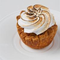 Key Lime Pie · Tart Key Lime filling topped with toasted marshmallow meringue.
