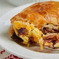 Bacon Breakfast Hand Pie · Cage Free Eggs, Berkwood Farms Bacon, Cheddar Jack cheese baked in a Tiny Pies® Crust.