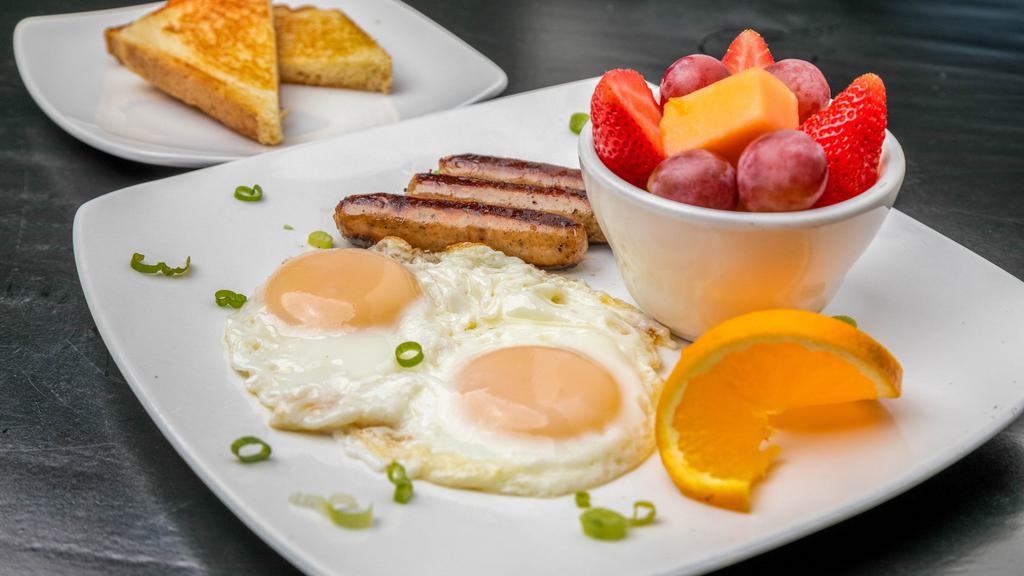 All American · *Two eggs, any style, with your choice of ham, bacon, or sausage. Served with breakfast potatoes, and Texas toast.