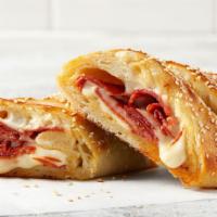 Individual Pepperoni Stromboli · Our signature cheese blend and fresh baked pepperoni’s, rolled in made-from-scratch dough, t...