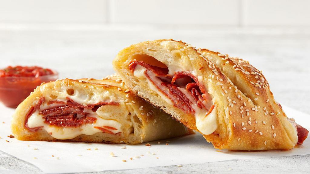 Individual Pepperoni Stromboli · Our signature cheese blend and fresh baked pepperoni’s, rolled in made-from-scratch dough, then baked to perfection.