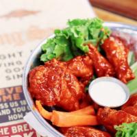 Saucer Wings · 10 hot wings served with carrots, celery, and a side of bleu cheese dressing for dipping.
