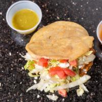 Gorditas · Two gorditas. Choose any kind of meat. Served with lettuce, cheese and cream.