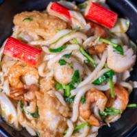 Spicy Cajun Seafood Udon Noodles · Wok-tossed udon noodles with a combination of seafood (shrimp, crabmeat, scallops, and fish)...