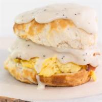 Smothered Biscuit · Eggs, Sausage or Bacon, Cheese, Gravy, Biscuit