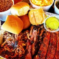 Family Bbq Meal · 3 Meats (2.5 lbs total), 4 sides, your choice of bread and sauces. Feeds 4-5 people. Must ch...