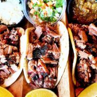 Taco Plate · Three street tacos stuffed with your choice of meat, onions and cilantro. Also includes your...