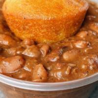 Cowboy Beans · Scratch-made pinto beans with ancho chili peppers and other goodies.