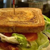 Breakfast Blt Sandwich · Bacon, bibb lettuce, tomato, avocado with over medium egg, Swiss cheese, and easy mayo on ry...