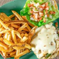 Southwest Burger · Two fresh beef patties, roasted poblanos, and grilled onions smothered in Pepper Jack cheese...