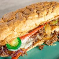 Texas Cheesesteak Sandwich · Fresh cooked roast beef, grilled with onions, peppers, mushrooms, jalapeños, and cheese. Ser...