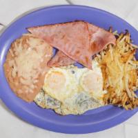 Eggs Mi Cabana Style · Your choice of ham, bacon, sausage or chorizo with hash browns and beans.