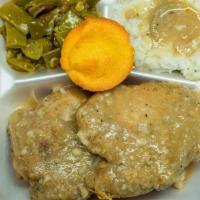 Smothered Fried Pork Chop 2Pc · Served with 3 sides and cornbread.