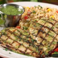 Cilantro Lime Chicken · Marinated chicken breast topped.  with cilantro-lime pesto. Served.  with coastal rice and s...