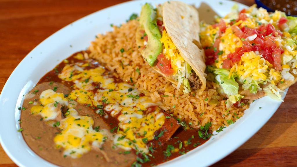 Build Your Own Combo (2) · Choose Two: cheese enchilada, crispy beef taco or crispy chicken taco, bean and cheese tostada, chicken flauta or chicken empanada. Served with Mexican rice and your choice of beans.