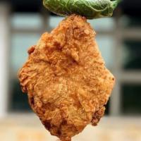 Chicken On A Stick · 6 oz fried chicken on a stick served with a grilled jalapeno and jalapeno cream dipping sauce.
