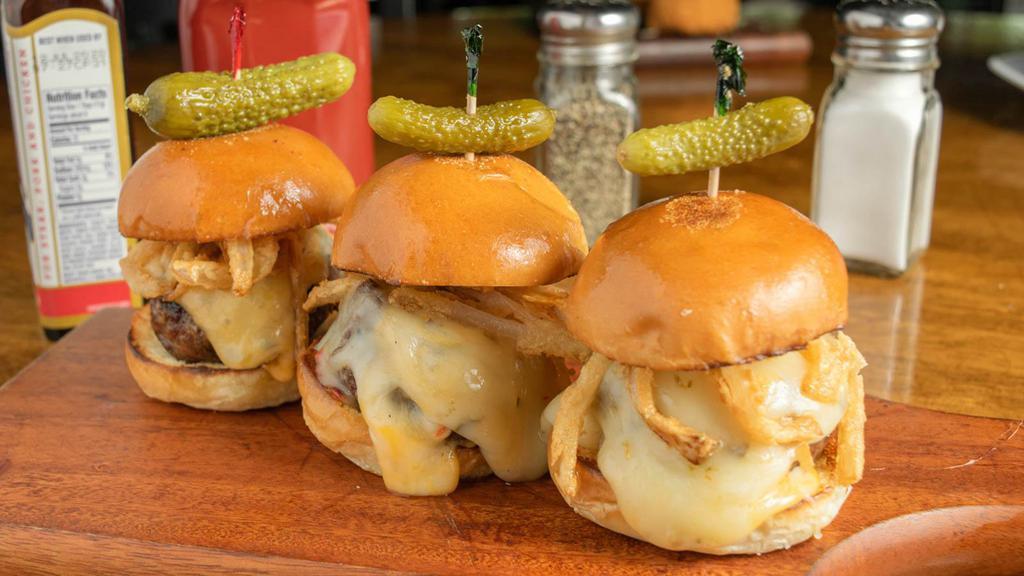 Cheese Burger Sliders · Trio of kobe beef mini burgers, melted cheddar, swiss & pepper jack cheese, topped with haytack onions.

Please allow for additional cooking time.