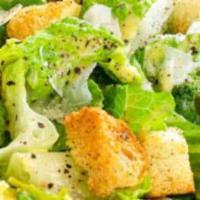 Caesar Salad · Chopped romaine, croutons, shredded parmesan & caesar dressing.