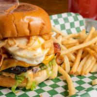 Signature Burger · Half pound beef patty or grilled chicken breast, lettuce, tomato, pickles, red onions, our s...