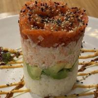 Ahi Tower · Layers of spicy tuna, avocado, crab, rice, and tobiko with spicy mayo, eel sauce, and wasabi...