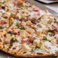 The Dream Roman Style Pizza · Very thin crust. House-made mozzarella, sauce, Gorgonzola, chicken, pancetta Italian bacon a...