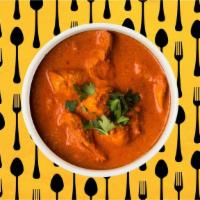 Chicken Tikka Masala · Oven-roasted chicken chunks in a rich creamy tomato and onion based gravy. Served with a por...