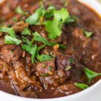 Lamb Vindaloo
 · Lamb cooked in hot, spicy sauce with potatoes.