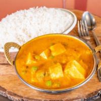 Mattar Paneer
 · Home made farmers cheese and green peas in a spicy gravy.