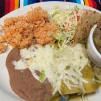 Combination #2 · 2 Cheese Enchiladas, 1 Shredded Beef Taco, Green Chile with Meat, served with refried beans ...