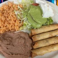 Flauta Plate · Four flautas, shredded beef or chicken, with sour cream and guacamole, served with mexican r...