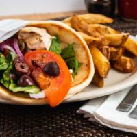 Lamb Original Wrap · charbroiled lamb tips, onions, tomatoes & tzaziki sauce
served with fresh-cut fries