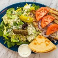 Tilapia Plate · 2 charbroiled filets served with greek salad, dolma, pita, onions, tomatoes and tzatziki sauce