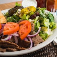 Demo'S Plate · Greek salad, dolma, pita, onions, tomatoes, tzatziki sauce and choice of double meat portion